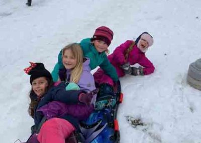 Grade 2 tobogganing - winter outdoor activities at Westminster Classical Christian Academy (WCCA)