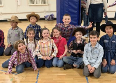 Student play dress-up in the gym at Westminster Classical Christian Academy (WCCA)